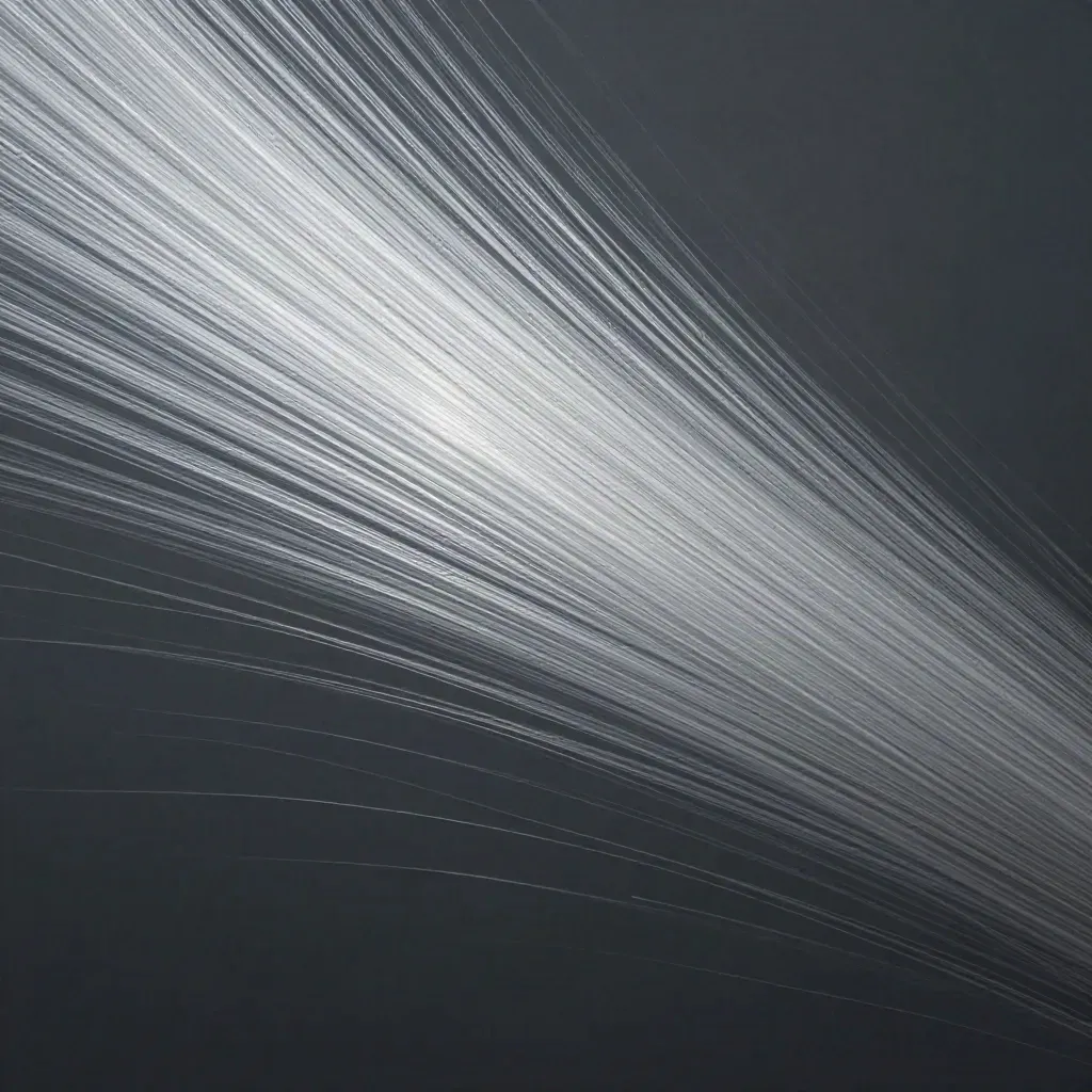 Silver filaments converge into a soft white bloom in a graphite haze with drifting motes.